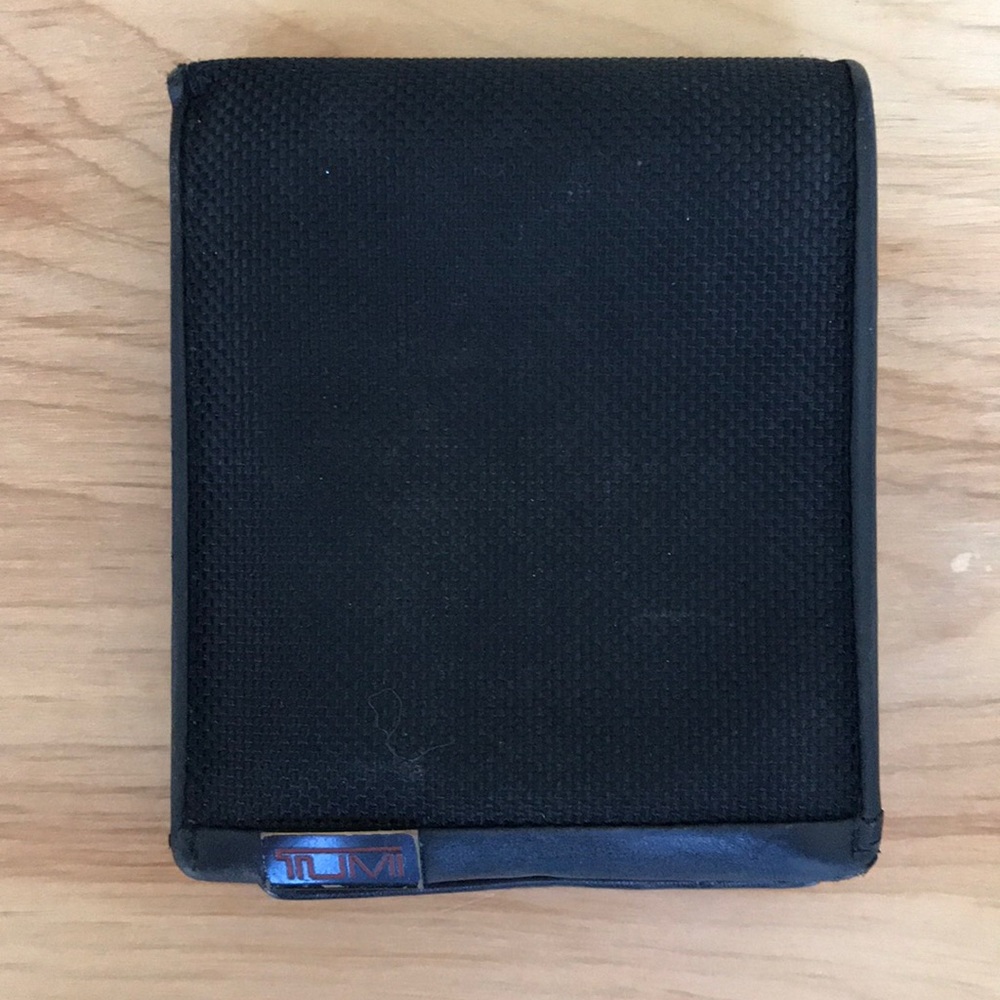 Tumi Tri gold wallet